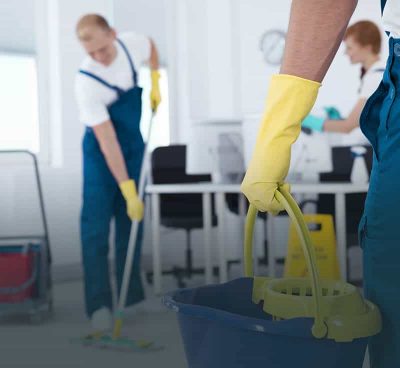 Image of person holding mop pail and man cleaning floor